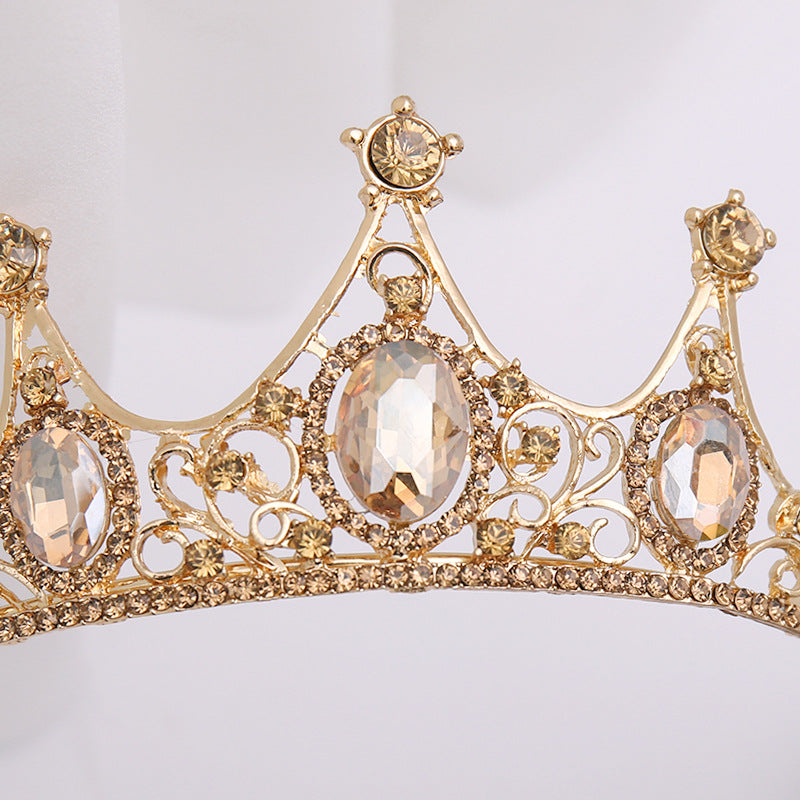 Our Champagne Crown offers a regal look suitable for any special occasion or simply for enjoying a regal grandeur in the comfort of one's own home. It is crafted from alloy and rhinestones and imported for quality assurance.
