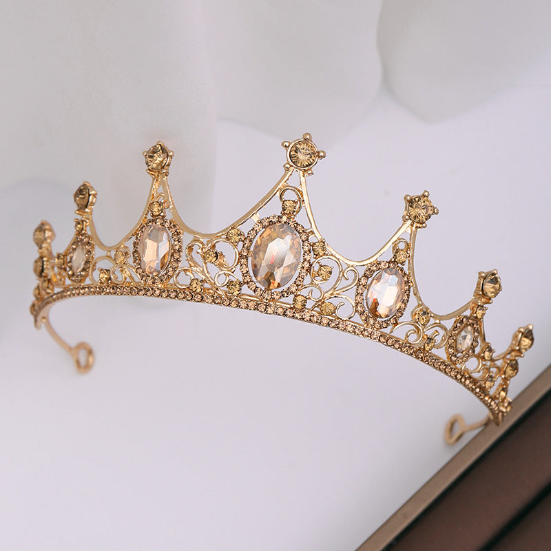 Our Champagne Crown offers a regal look suitable for any special occasion or simply for enjoying a regal grandeur in the comfort of one's own home. It is crafted from alloy and rhinestones and imported for quality assurance.