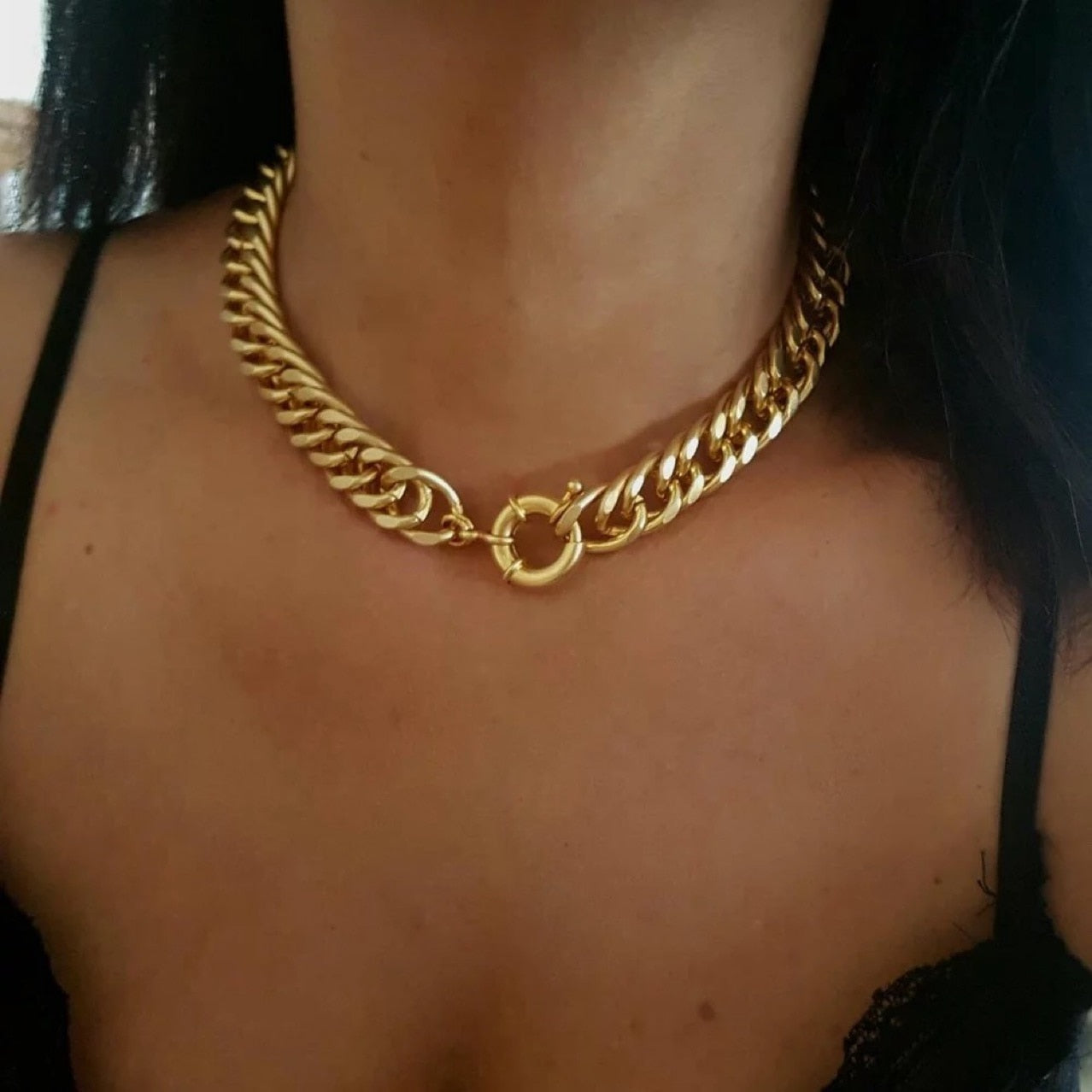 Winner's Circle Chunky Chain in Gold on model's neck with clasp showing