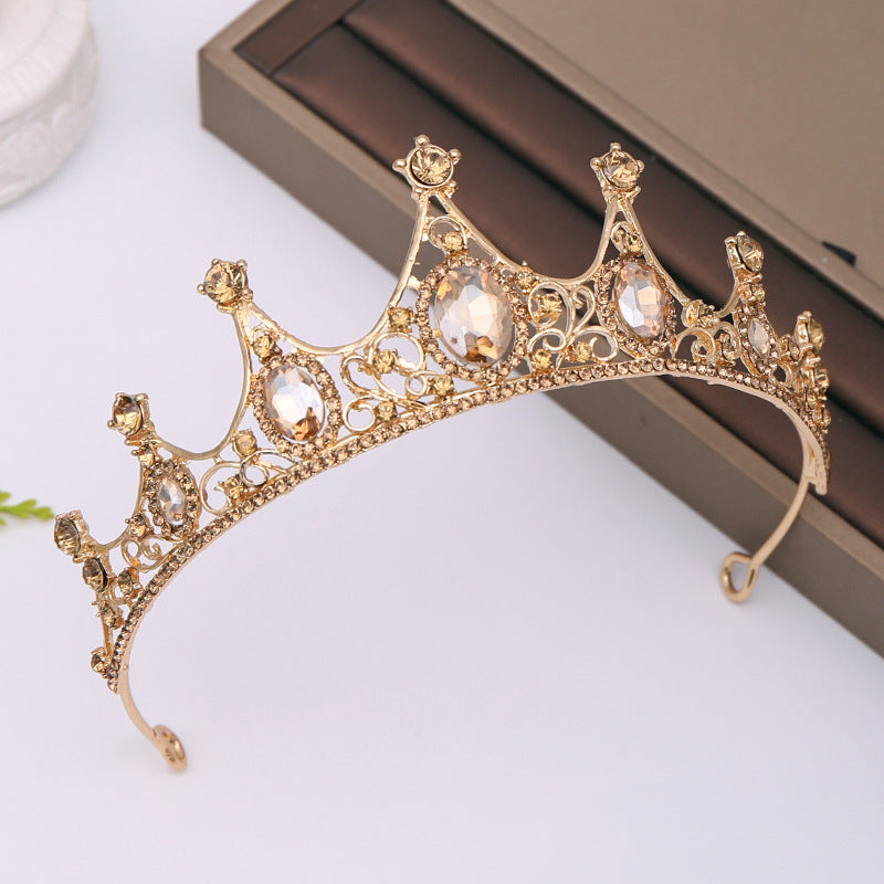 Our Champagne Crown offers a regal look suitable for any special occasion or simply for enjoying a regal grandeur in the comfort of one's own home. It is crafted from alloy and rhinestones and imported for quality assurance.