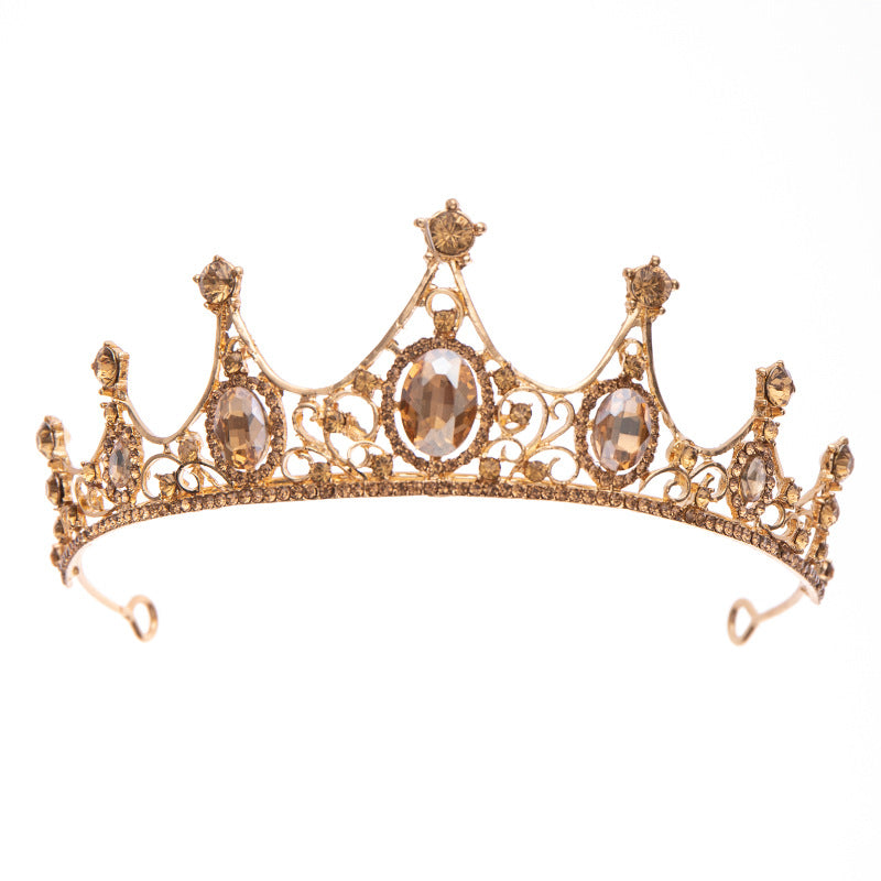 Our Champagne Crown offers a regal look suitable for any special occasion or simply for enjoying a regal grandeur in the comfort of one's own home. It is crafted from alloy and rhinestones and imported for quality assurance.